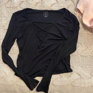 Black long sleeve low neck cut out